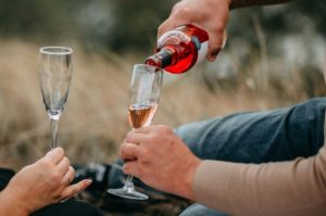 Pouring a glass of rose wine